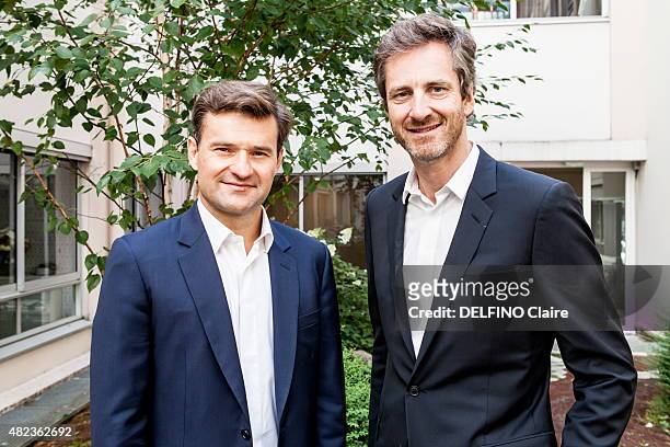 Founders of the company Webhelp, Frederic Jousset and Olivier Duha pose on July 16, 2015 in Paris, France.