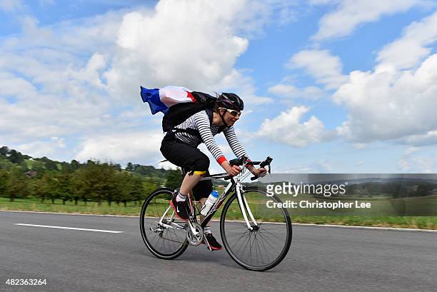 French fan cycles along the course during the Time Trials on Day 2 of the UCI Para-Cycling Road World Championship on July 30, 2015 in Lucerne,...