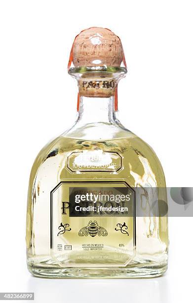 reposado patron tequila bottle - lechuguilla cactus stock pictures, royalty-free photos & images