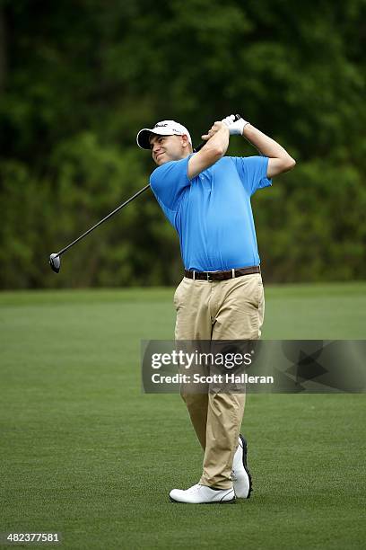 Bill Haas of the United States plays his second shot on the eighth hole during round one of the Shell Houston Open at the Golf Club of Houston on...