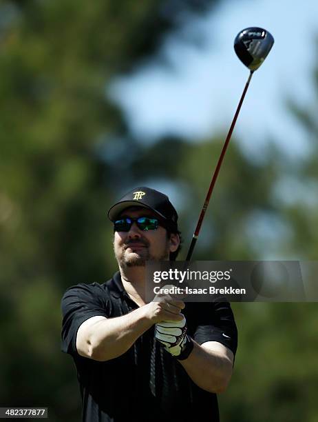World champion poker player Phil Hellmuth hits a tee shot during ARIA Resort & Casino's 13th Annual Michael Jordan Celebrity Invitational at Shadow...