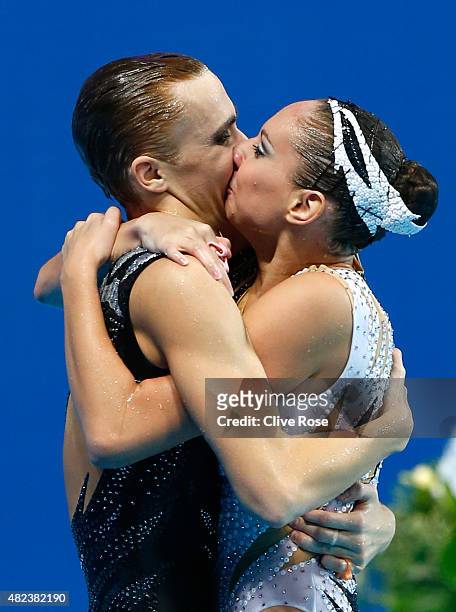 Darina Valitova and Aleksandr Maltsev of Russia celebrate after winning the gold medal in the Mixed Duet Free Synchronised Swimming Final on day six...