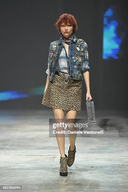 Model walks the runway during the Diesel FW14 Collection Presentation Show at Tese di San Cristoforo on April 3, 2014 in Venice, Italy.