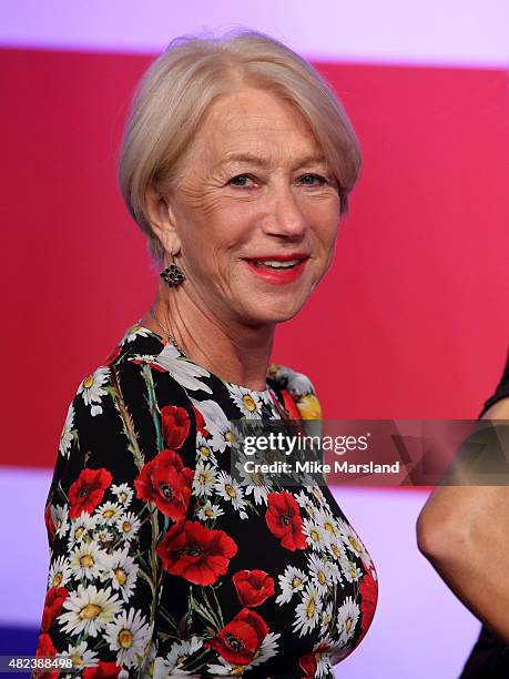 Actress Helen Mirren meets her 3 wax figures at Madame Tussauds on July 30, 2015 in London, England.