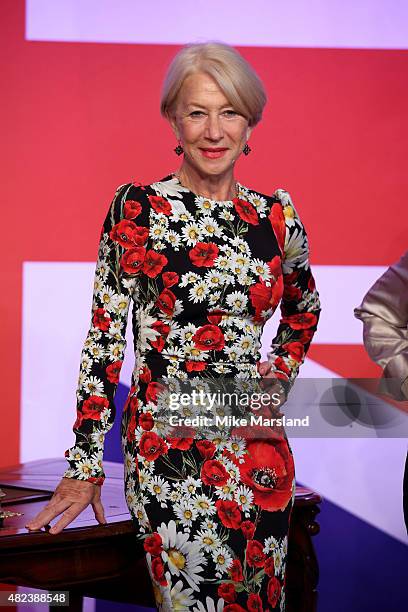 Actress Helen Mirren meets her 3 wax figures at Madame Tussauds on July 30, 2015 in London, England.