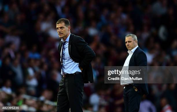 Slaven Bilic, Manager of West Ham and Marius Sumudica, Manager of Astra Giurgiu look on during the UEFA Europa League third qualifying round match...