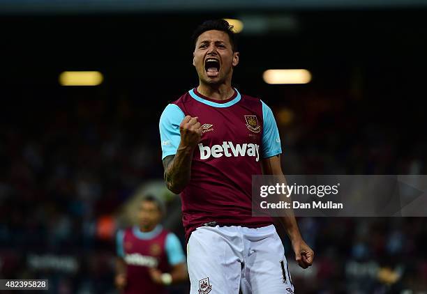 Mauro Zarate of West Ham celebrates scoring his side's second goal during the UEFA Europa League third qualifying round match between West Ham United...