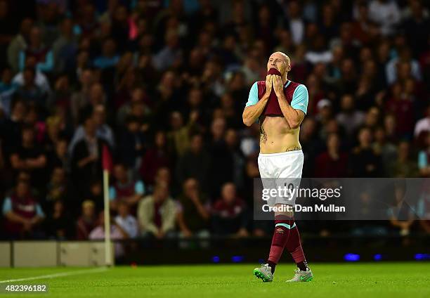 James Collins of West Ham leaves the field dejected after being shown a red card by Referee, Adrien Jaccottet during the UEFA Europa League third...