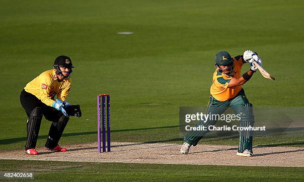 Samit Patel of Nottinghamshire hits out while Craig Cachopa of Sussex looks on during the Royal London One-Day Cup match between Sussex and...