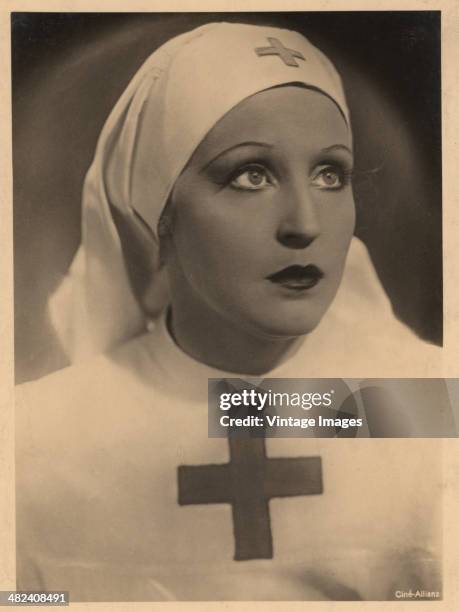 German actress Brigitte Helm as a Red Cross nurse, circa 1928. A publicity still from a Cine-Allianz film.