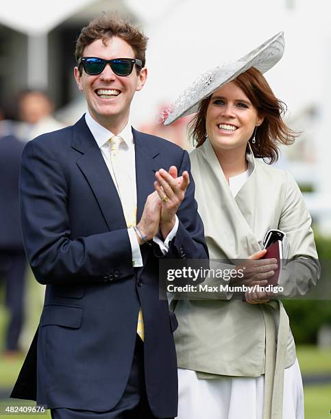 Princess Eugenie and Jack Brooksbank watch the racing as they attend day three of the Qatar Goodwood Festival at Goodwood Racecourse on July 30, 2015...