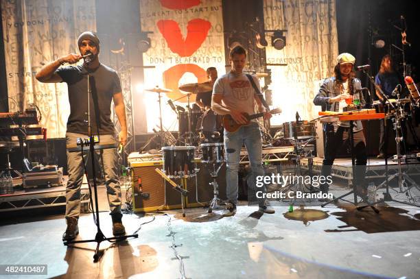 Mike Taylor, Joel Cassidy, Ryan Marshall, Gianni Luminati and Lee Bolt of Walk Off The Earth perform on stage at Shepherds Bush Empire on April 3,...