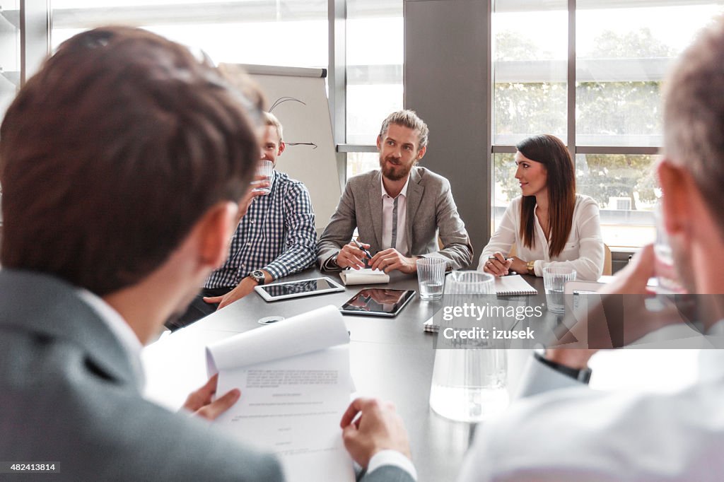 Business team having meeting in a board room