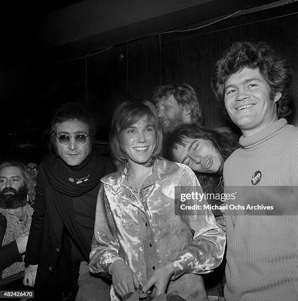 Drinking buddies known as 'The Hollywood Vampires' (L-R -- John Lennon , Harry Nilsson, Alice Cooper and Micky Dolenz celebrate an early Thanksgiving...