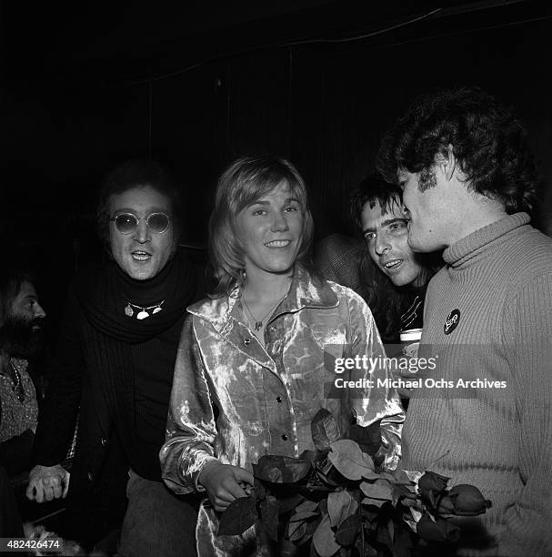 Drinking buddies known as 'The Hollywood Vampires' (L-R -- John Lennon , Harry Nilsson, Alice Cooper and Micky Dolenz celebrate an early Thanksgiving...