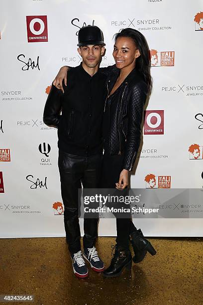 Tyler White and Symon Leone attend the Pejic x Snyder Jewelry Line Launch Party at Gilded Lily on April 3, 2014 in New York City.