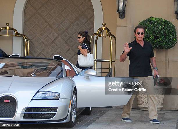 Arnold Schwarzenegger and Maria Shriver are seen on July 30, 2015 in Los Angeles, California.