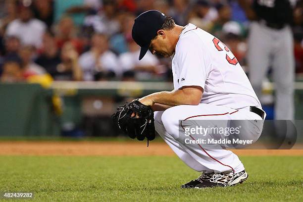 Steven Wright of the Boston Red Sox prepares to pitch against the Chicago White Sox during the third inning at Fenway Park on July 30, 2015 in...