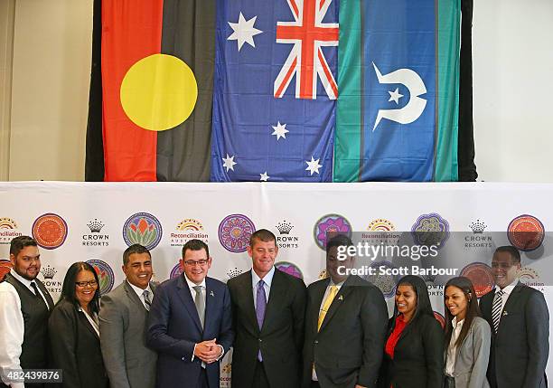 James Packer, Crown Resorts Chairman and Daniel Andrews MP, Premier of Victoria pose with members of the indigenous employee group as they launch...