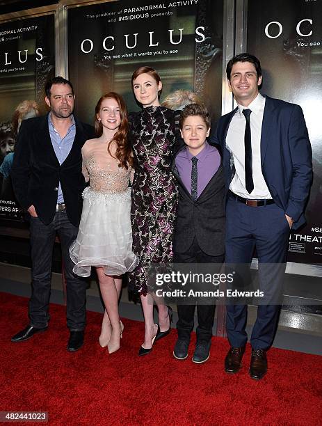 Actors Rory Cochrane, Annalise Basso, Karen Gillan, Garrett Ryan and James Lafferty arrive at the Los Angeles premiere of "Oculus" at the TLC Chinese...