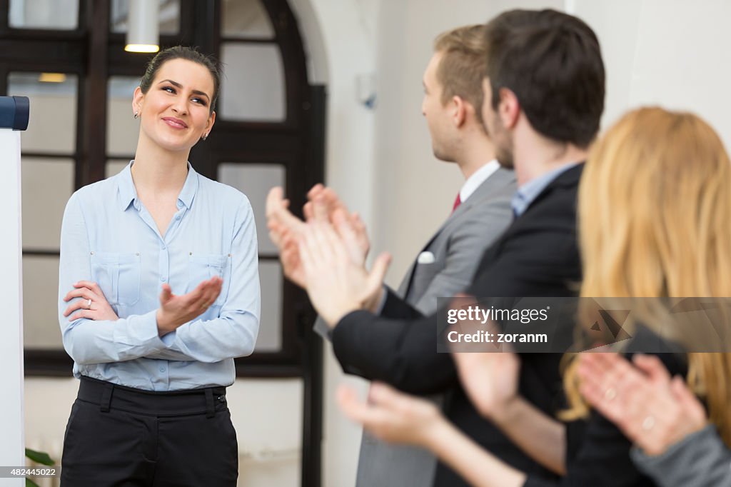 Business team applauding