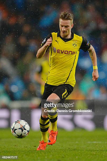 Marco Reus of Borussia Dortmund controls the ball during the UEFA Champions League Quarter Final first leg match between Real Madrid and Borussia...