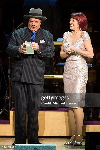 Actors Nathan Lane and Megan Mullally perform during "Guys And Dolls" at Carnegie Hall on April 3, 2014 in New York City.