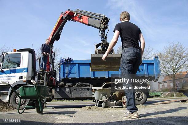 Contractor Loading Contractor Loading Truck Photos and Premium High Res Pictures - Getty ...