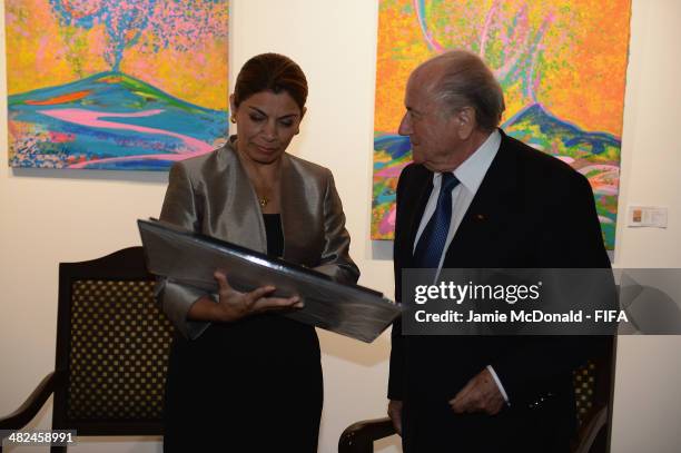 President of Costa Rica Laura Chinchilla Miranda and FIFA President Joseph S. Blatter attend the FIFA banquet at the Country Club on April 3, 2014 in...