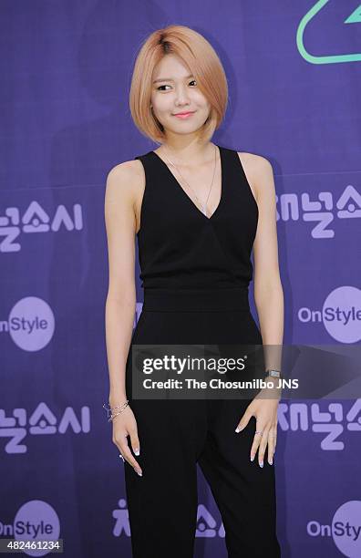 Girls' Generation pose for photographs during the OnStyle 'Channel Girls' Generation' press conference at Imperial Palace on July 21, 2015 in Seoul,...