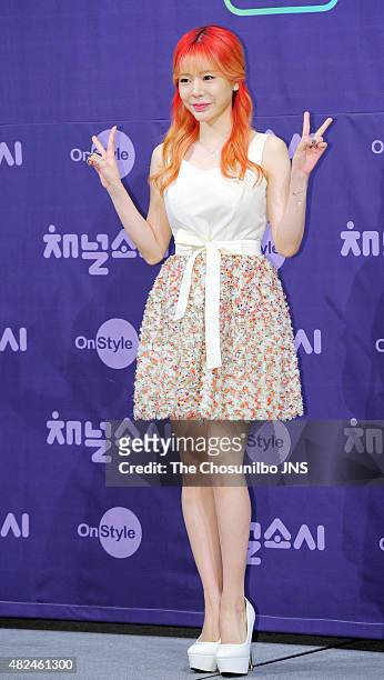 Girls' Generation pose for photographs during the OnStyle 'Channel Girls' Generation' press conference at Imperial Palace on July 21, 2015 in Seoul,...