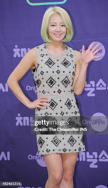 Girls' Generation pose for photographs during the OnStyle 'Channel Girls' Generation' press conference at Imperial Palace on July 21, 2015 in Seoul,...