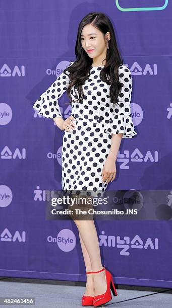 Girls' Generation pose for photographs during the OnStyle 'Channel Girls' Generation' press conference at Imperial Palace on July 21, 2015 in Seoul,...