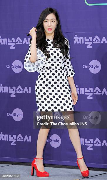 Girls' Generation pose for photographs during the OnStyle 'Channel Girls' Generation' press conference at Imperial Palace on July 21, 2015 in Seoul,...