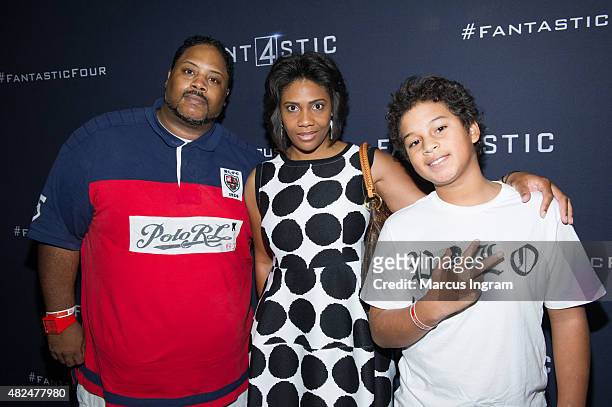 Bone Crusher , Jennay Frazier and family attend "Fantastic Four" Atlanta VIP Screening at Cinebistro on July 30, 2015 in Atlanta, Georgia.