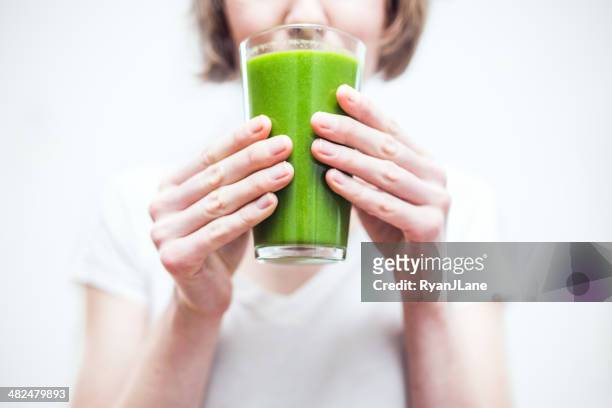 healthy green smoothie - smoothie sparse stock pictures, royalty-free photos & images