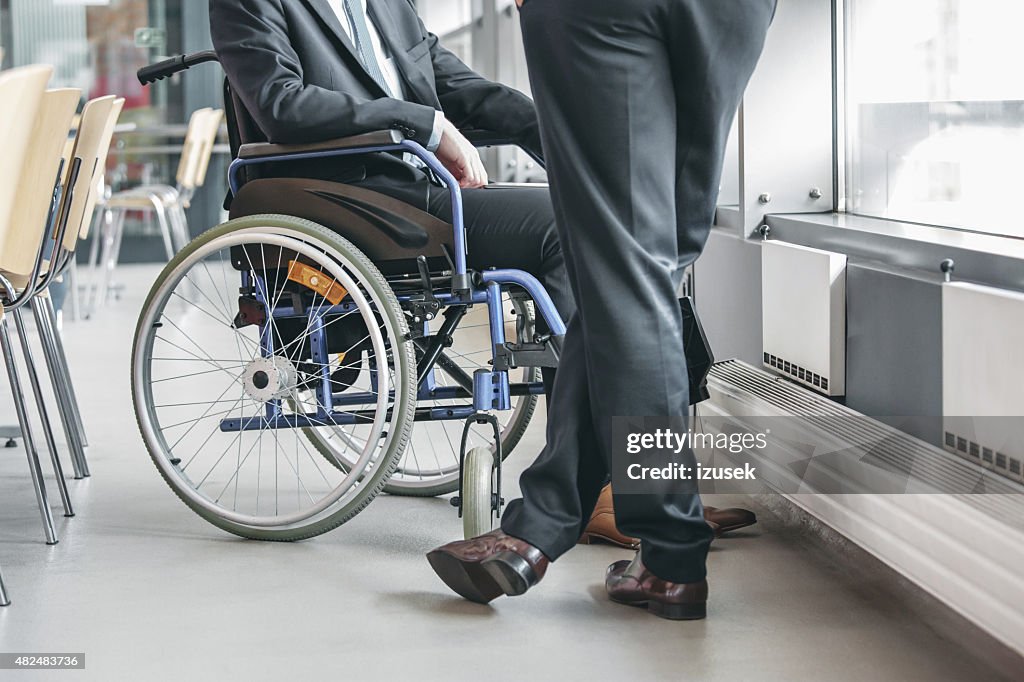 Disabled businessman working in an office