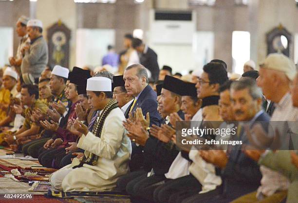 Turkish President Recep Tayyip Erdogan attends Friday prayer at Istiqlal Grand Mosque on July 31, 2015 in Jakarta, Indonesia. President Erdogan is on...