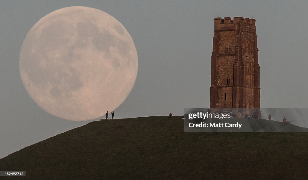 Blue Moon Rises Over Glastonbury Tor