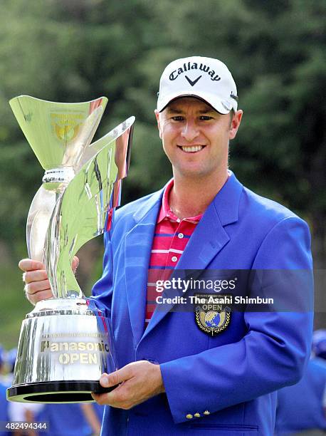 Brendan Jones of Australia poses for photographs with the trophy after winning the Asia-Pacific Panasonic Open at Rokko Kokusai Golf Club East Course...