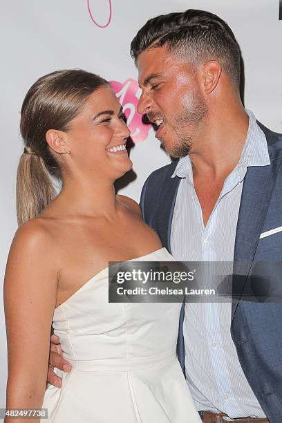 Personalities Brittany Cartwright and Jax Taylor attend Katie Maloney's Pucker and Pout launch party at Frederic Fekkai Hair Salon on July 30, 2015...