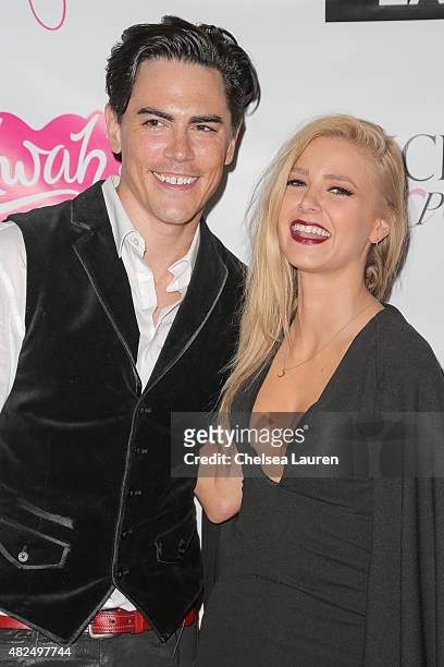 Personalities Tom Sandoval and Ariana Madix attend Katie Maloney's Pucker and Pout launch party at Frederic Fekkai Hair Salon on July 30, 2015 in...