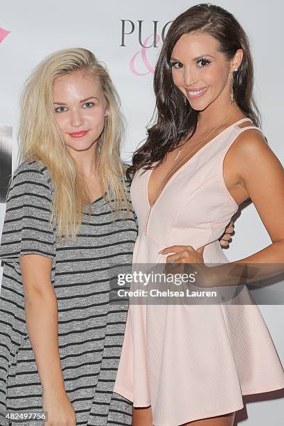 Cortney Van Olphen and sister, TV personality Scheana Marie attend Katie Maloney's Pucker and Pout launch party at Frederic Fekkai Hair Salon on July...