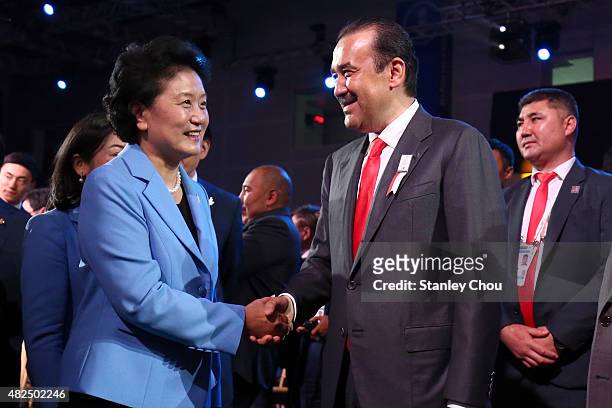 Liu Yandong, Vice Premier of the State Council of China Republic and Head of the Beijing 2022 Delegation is congratulated by Karim Massimov, Prime...