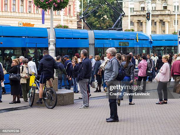 waiting for train in centre of zagreb, croatia - zagreb street stock pictures, royalty-free photos & images