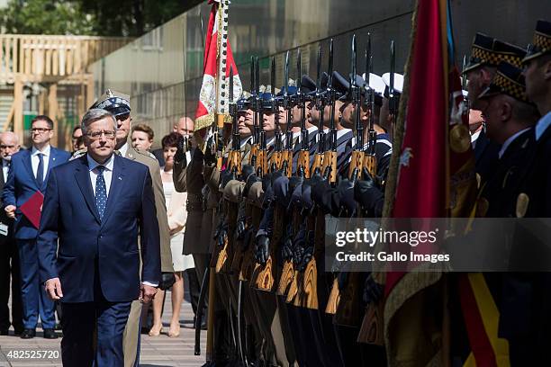 President Bronislaw Komorowski inspects the guard of honour before meeting between President Bronislaw Komorowski and Warsaw's Insurgents on July 31,...