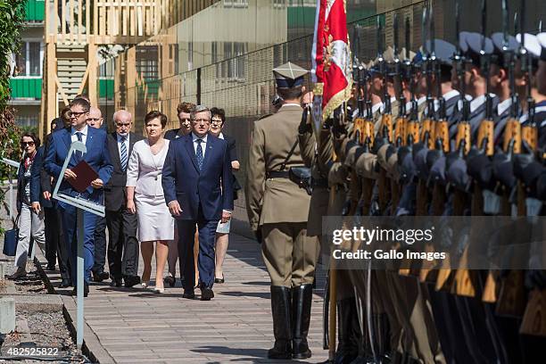 President Bronislaw Komorowski inspects the guard of honour before meeting between President Bronislaw Komorowski and Warsaw's Insurgents on July 31,...