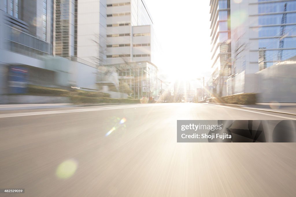 Road in city with sunlight