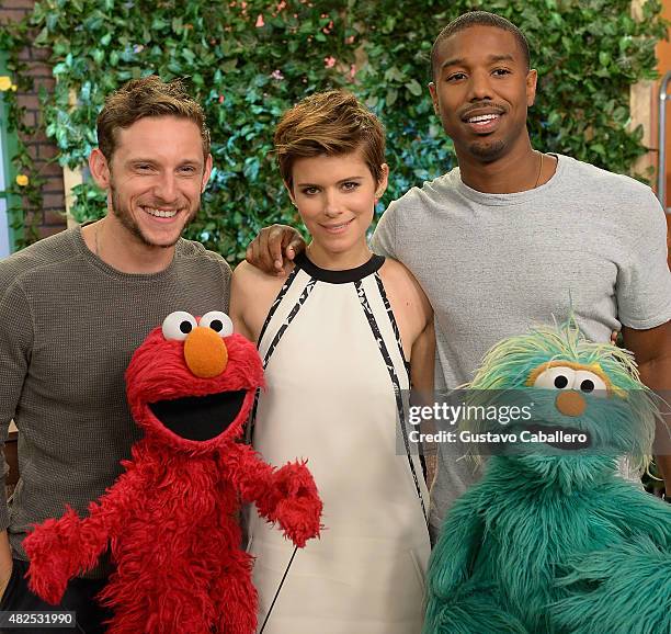 Jamie Bell, Kate Mara, Michael B. Jordan are seen Sesame Street characters Elmo and Rosita on the set of Despierta America to promote the film...