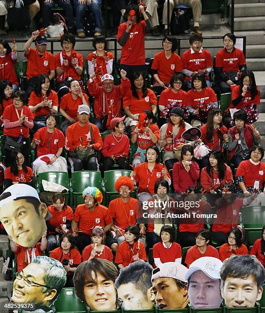 Fans cheer on Tatsuma Ito of Japan as he play against Radek Stepanek of Czech Republic in a match between Japan v Czech Republic during the Davis Cup...